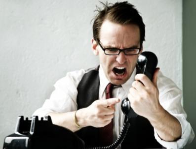 Man getting angry while on the phone