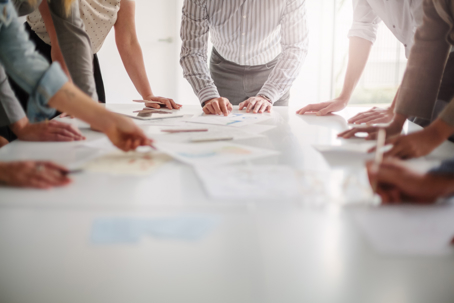 people working with ideas and brainstorming together