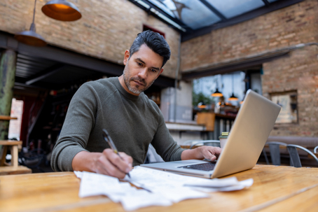 business manager using his laptop